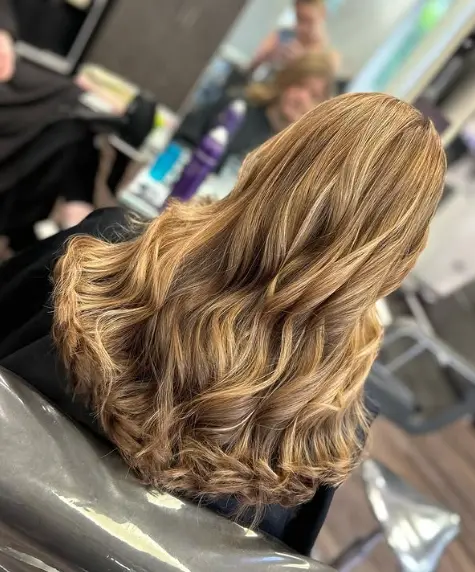 Golden blonde hair colour by Hair By Amy