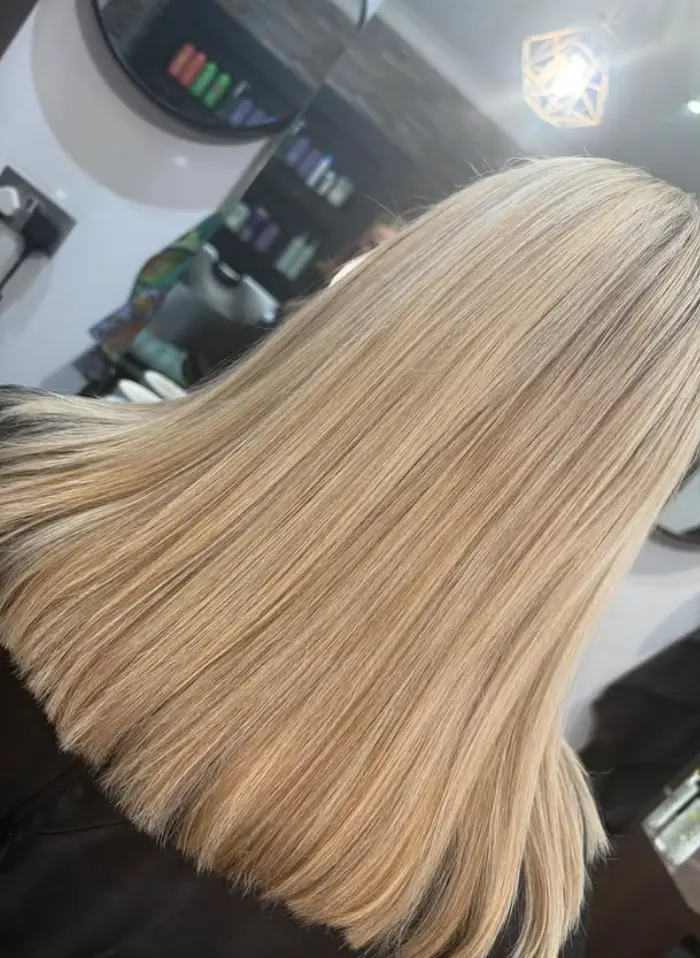 Soft blonde tones hair cut